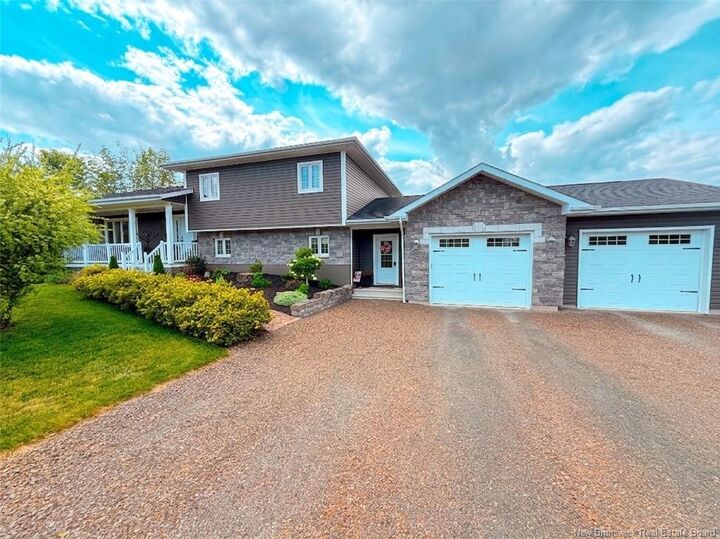 Property Photo: 63 Birchwood Drive NB E7N 1M7