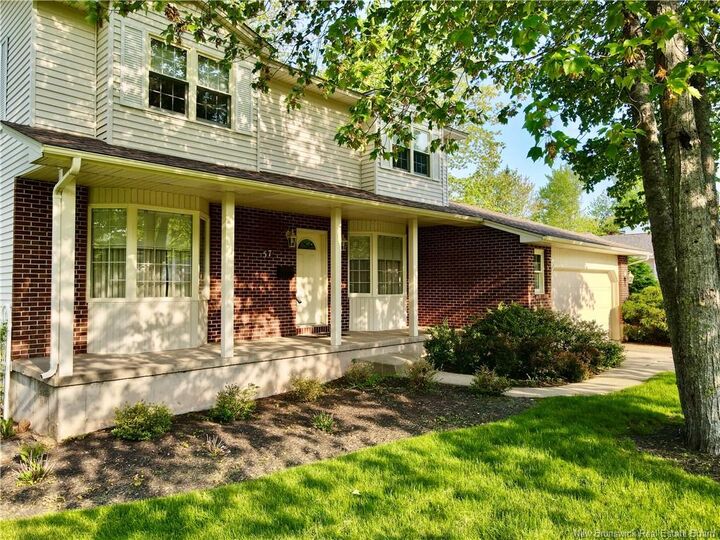 Property Photo: 57 Fairway Boulevard NB E1B 4J5