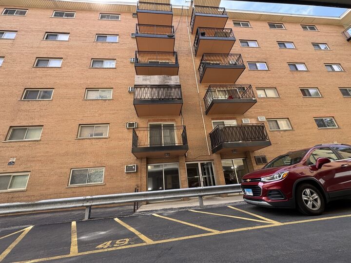 Property Photo: 7432 W Washington Street 604 IL 60130