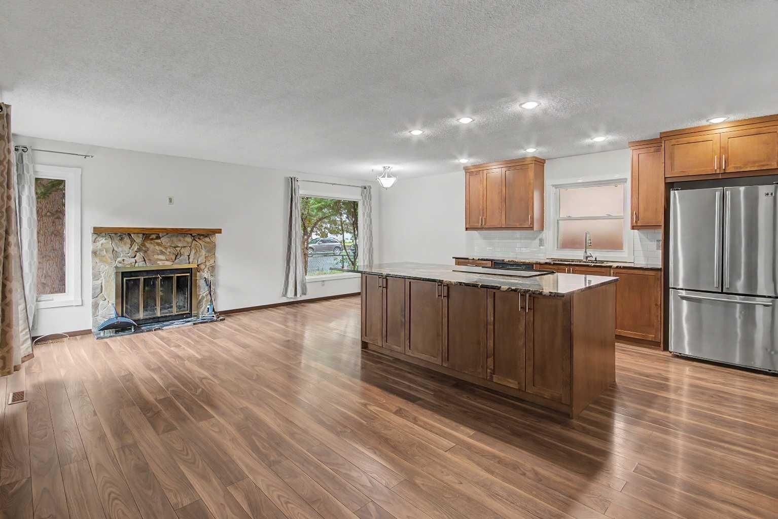 Property Photo:  115 McKenna Crescent SE  AB T2Y 1Y2 