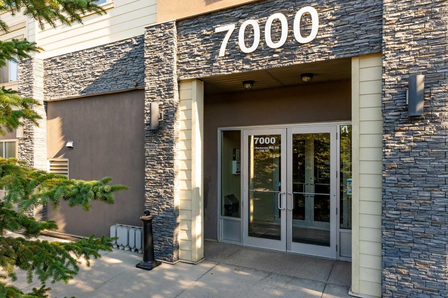Property Photo:  403 Mackenzie Way SW 7202  AB T4B 3V7 