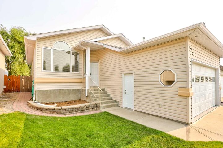 Property Photo: 472 Heritage Boulevard W AB T1K 7V9