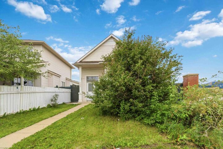 Property Photo: 102 Dominion Drive AB T9K 2N2