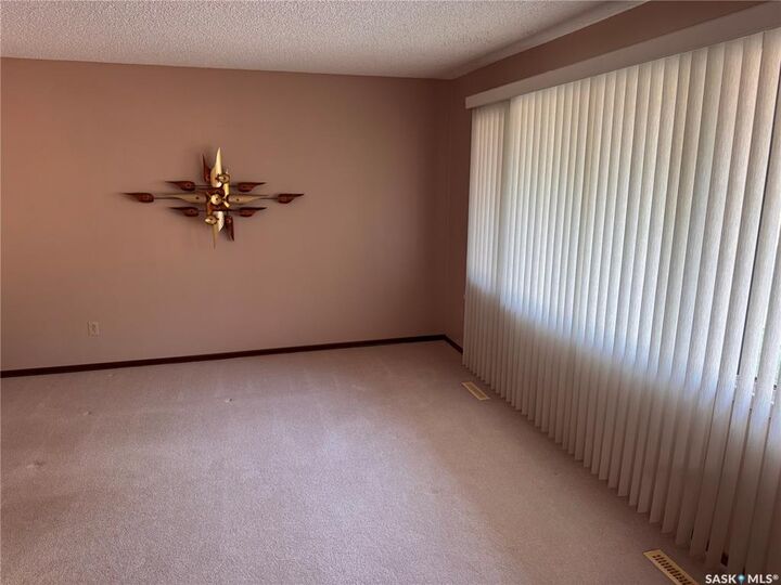 Property Photo: 125 Garnet Street N SK S4R 3S7