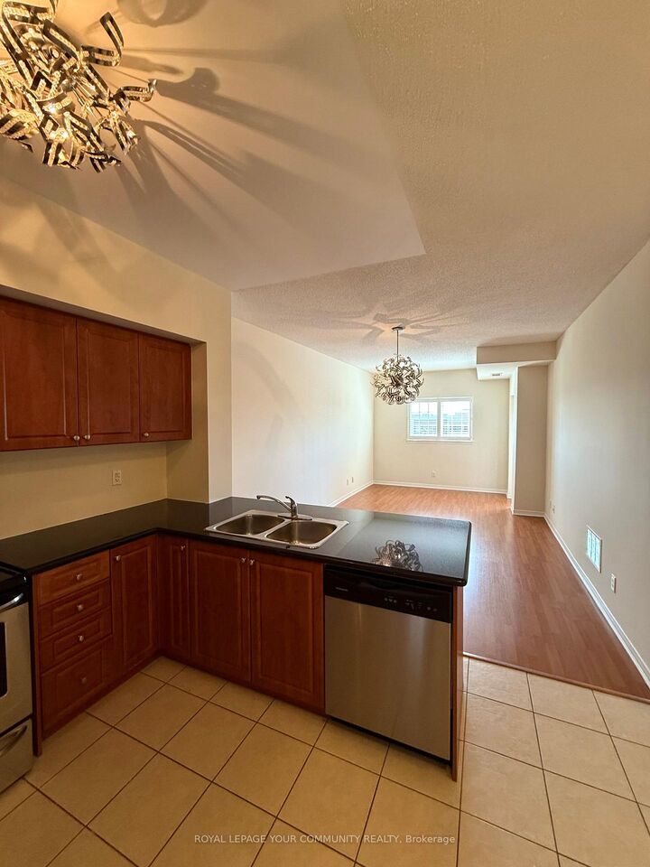 Property Photo:  9451 Jane Street 301  ON L6A 4H8 
