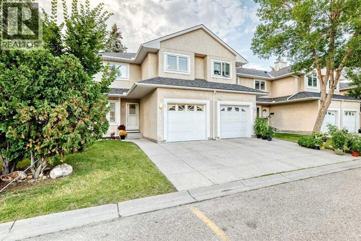 Property Photo: 388 Sandarac Drive Northwest AB T3K 4E3