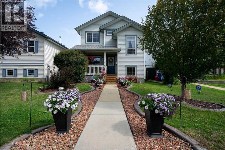 Property Photo:  312 Diefenbaker Drive  AB T9K 2K1 