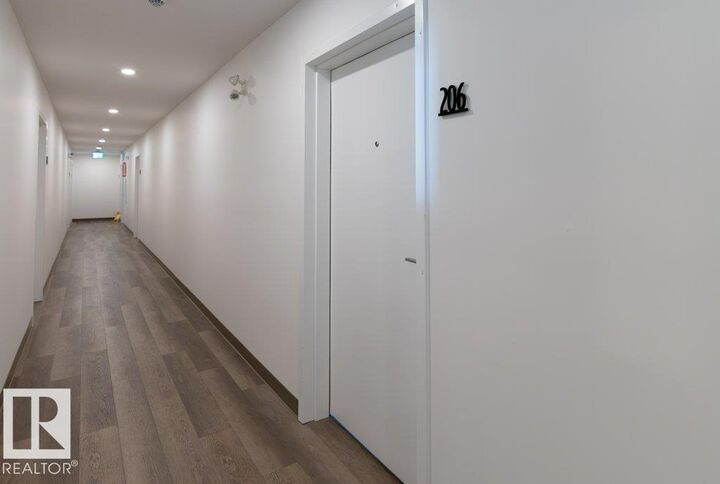 Property Photo: 9211 228 Street NW 206 AB T5T 4T1