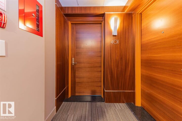 Property Photo: 11969 Jasper Avenue NW 401 AB T5K 0P1