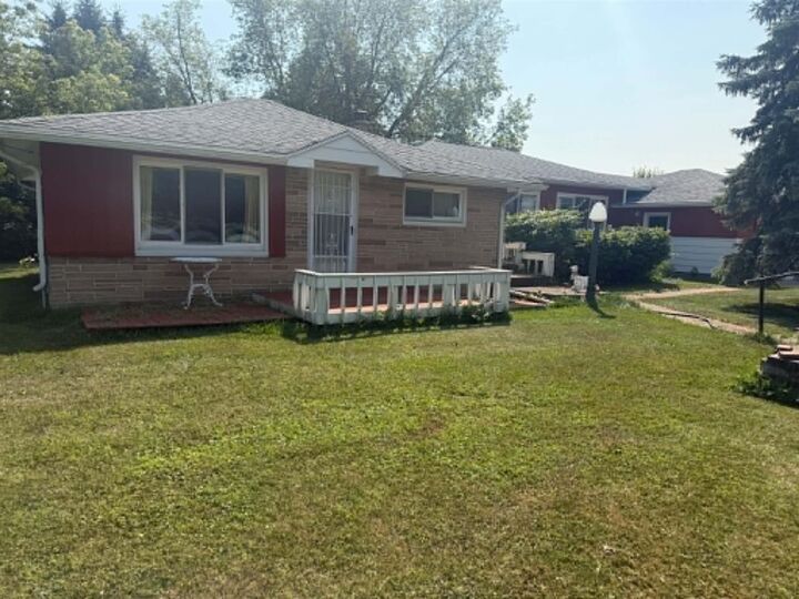 Property Photo:  1820 SE Boutell Road  MI 48732-9704 