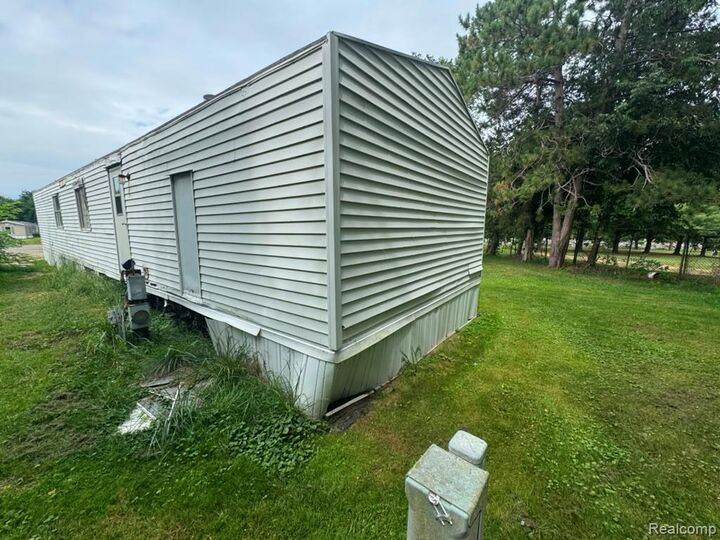 Property Photo:  926 Hill St Lot #18  MI 48875 1563 