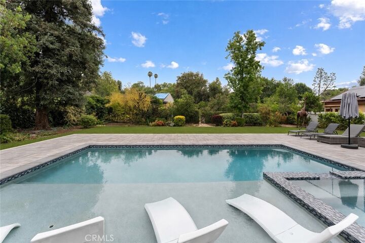 Property Photo:  5953 Lubao Avenue  CA 91367 