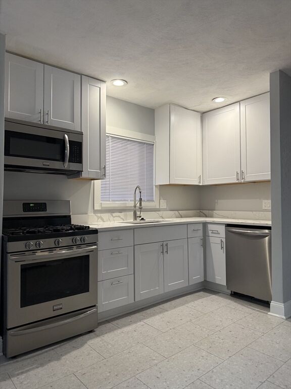Property Photo:  252 Marion 1  MA 02128 
