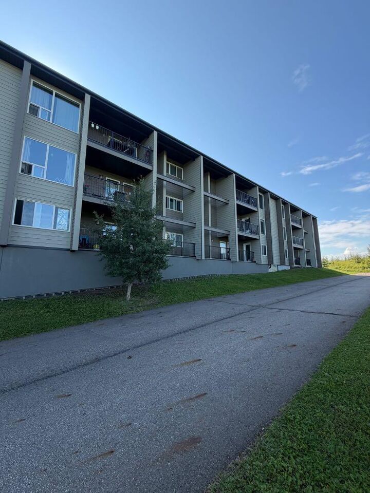 Property Photo: 201 Abasand Drive 1330 AB T9J 1J1