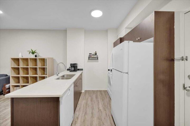 Property Photo: 73 Erin Woods Court SE 1108 AB T2B 3V2