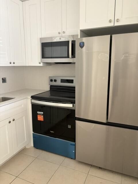 Property Photo:  230 Fanshaw F F-230  FL 33434 