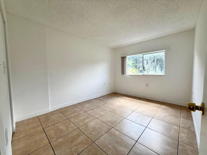 Property Photo:  1239 N Benoist Farms Road 110  FL 33411 