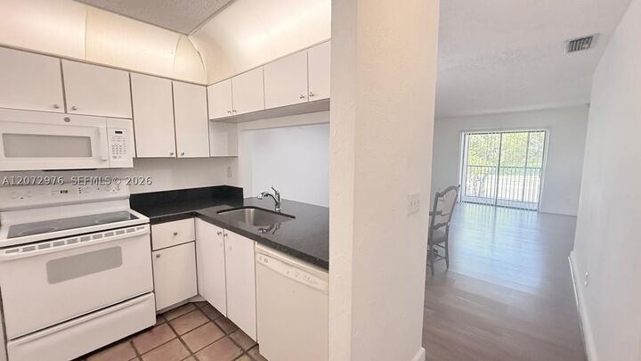 Property Photo:  10361 NW 11th St 203  FL 33026 