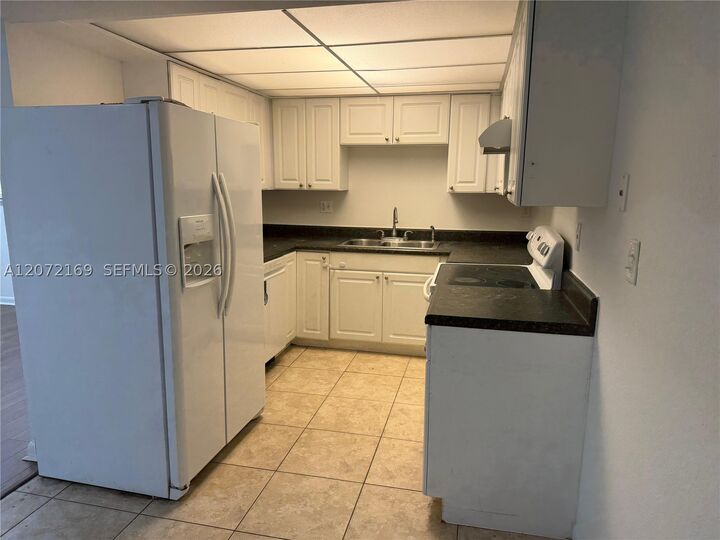 Property Photo:  11101 Royal Palm Blvd 203  FL 33065 