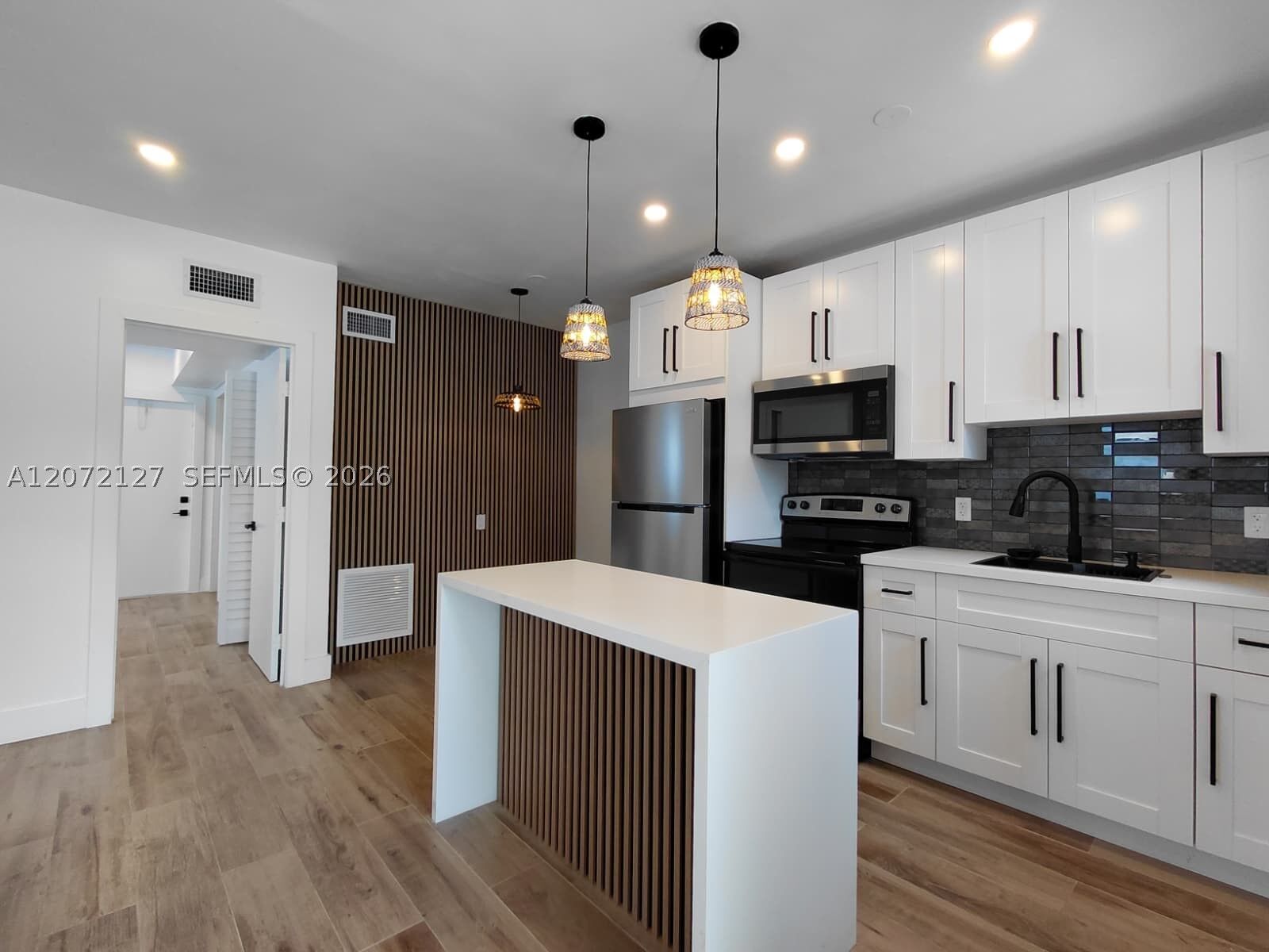 Property Photo: 1430 NW 45th St 1 FL 33142
