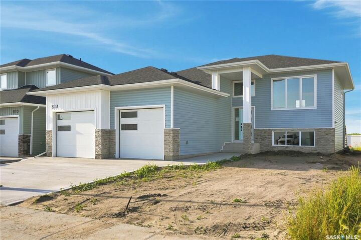 Property Photo: 824 Ballesteros Crescent SK S0K 4S0