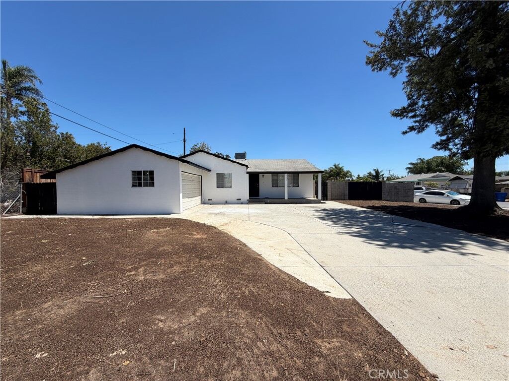 Property Photo:  9227 Bruce Avenue  CA 92503 