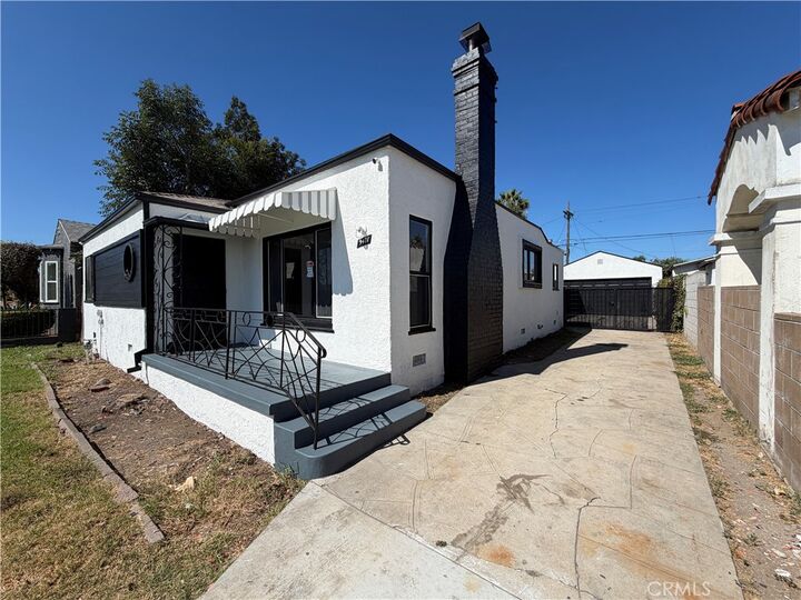 Property Photo:  9471 La Salle Avenue  CA 90047 
