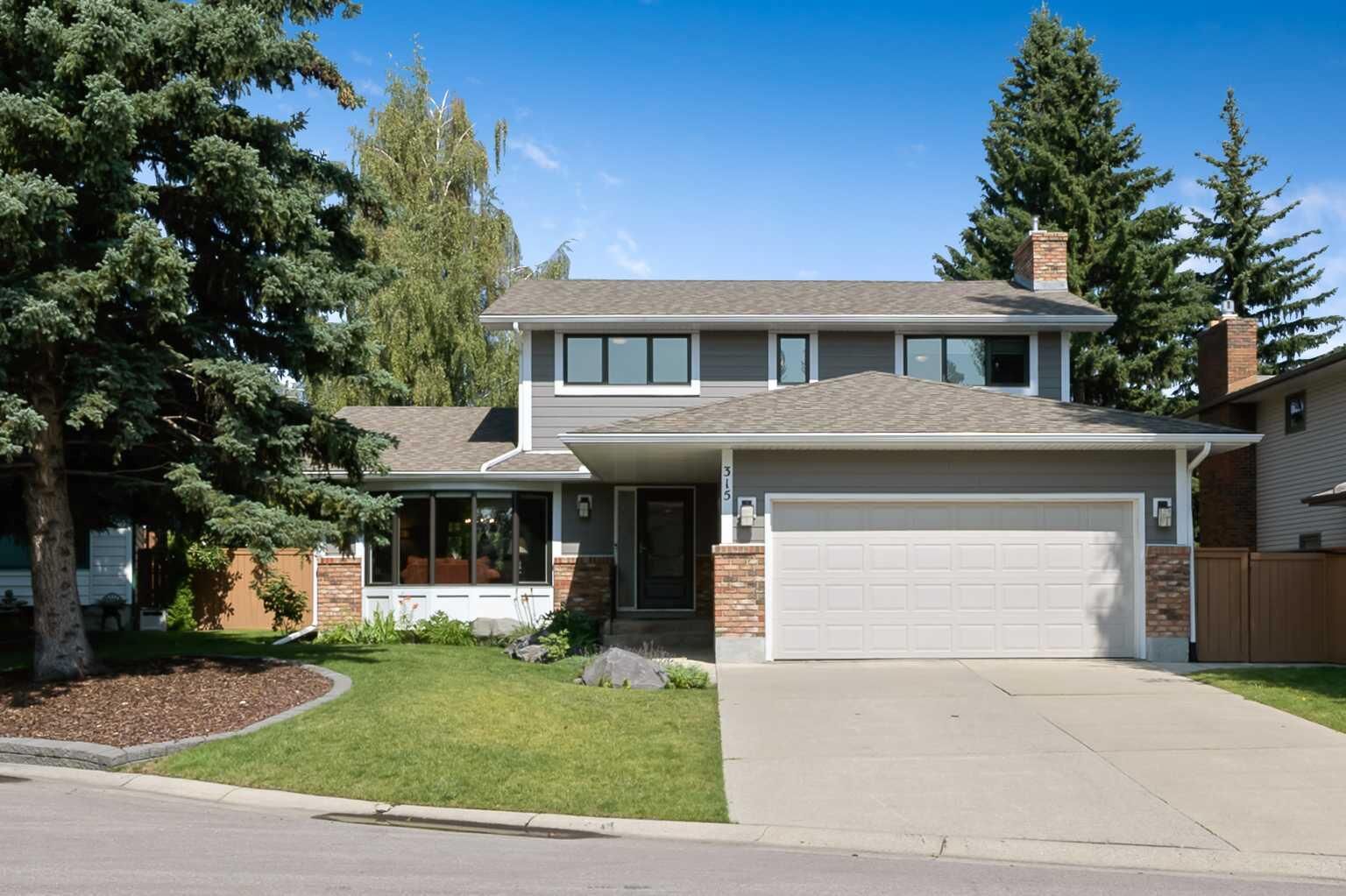 Property Photo: 315 Woodpark Place SW AB T2W 2X9