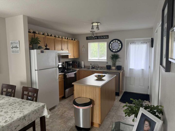 Property Photo: 13005 93 Street AB T8X 1S5