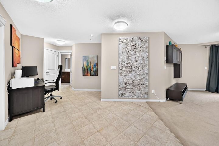 Property Photo:  130 Panatella Street NW 1110  AB T3K 0Y6 