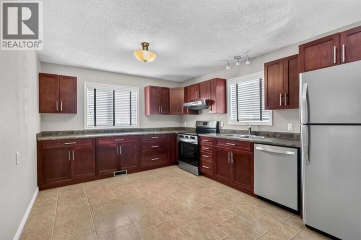 Property Photo: 177 Leigh Crescent AB T9K 1K2