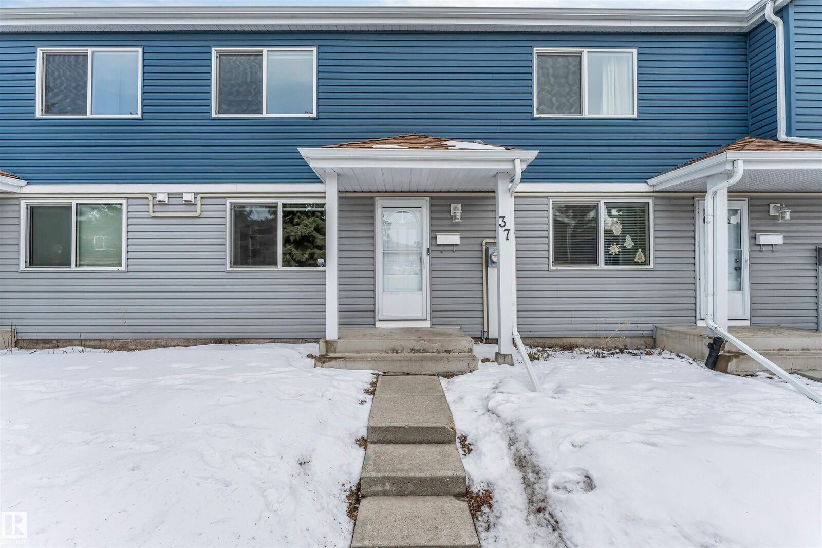 Property Photo: 1411 Mill Woods Road NW 37 AB T6L 4T3