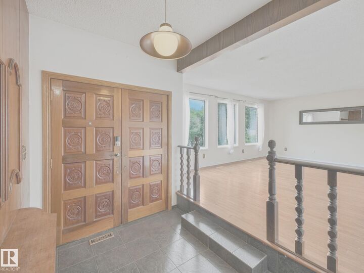 Property Photo:  11056 166 Avenue NW  AB T5X 1Y3 