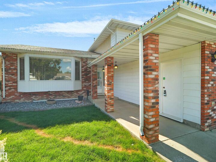 Property Photo:  7357 18 Avenue NW  AB T6K 2B5 