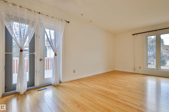 Property Photo:  12229 39 Street NW  AB T5W 2K2 
