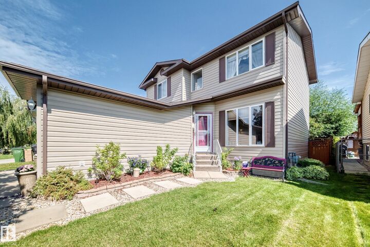Property Photo:  13069 37 Street NW  AB T5A 5A4 