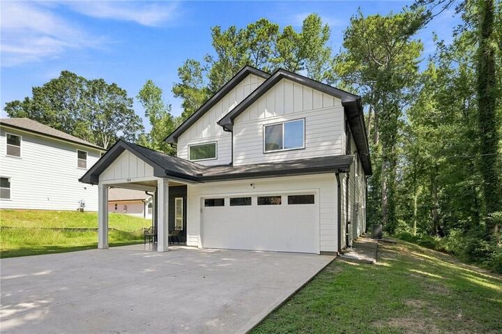 Property Photo:  184 Woodland Lane SW  GA 30126 