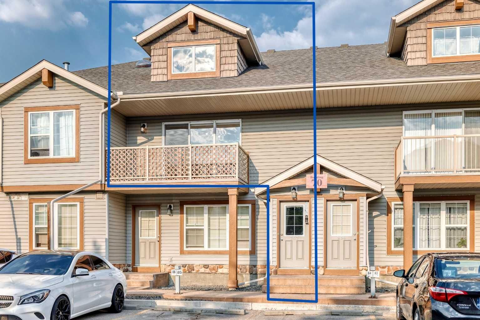 Property Photo: 70 Panatella Landing NW 203 AB T3K 0K2