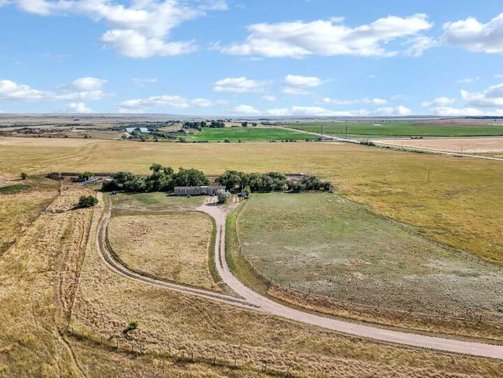 Property Photo:  12013A Black &Amp White Trail  AB T1A 7H1 