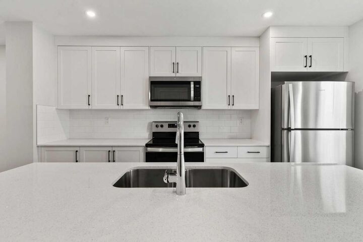 Property Photo: 40 Livingston Parade NE 203 AB T3P 2K4