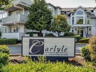 Property Photo:  19412  48th Ave  W 105  WA 98036 
