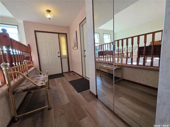 Property Photo:  411 Milburn Crescent  SK S9H 4X8 