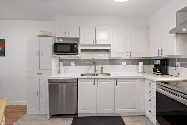 Property Photo:  5765 Glover Road 202  BC V3A 8M8 