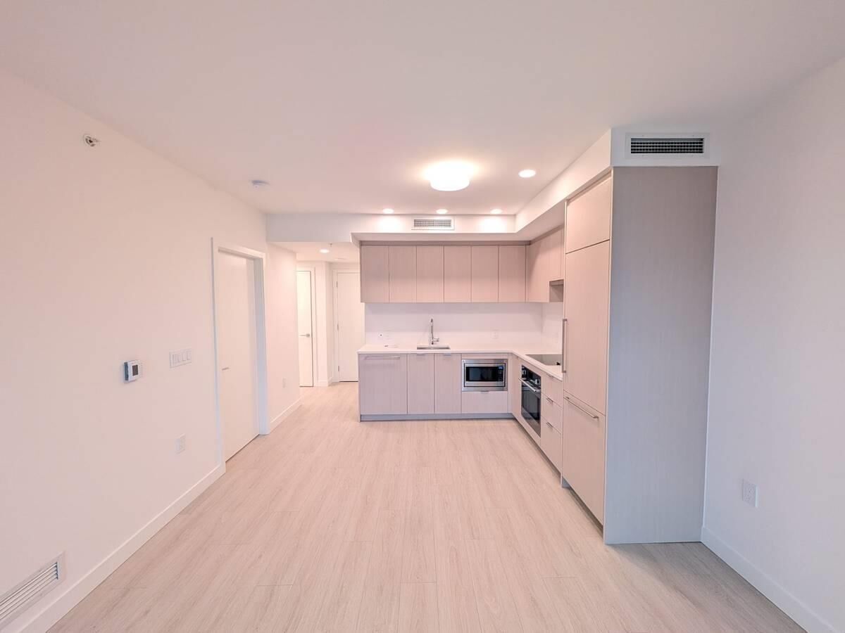 Property Photo:  13675 107A Ave 16xx  BC V3T 2H2 