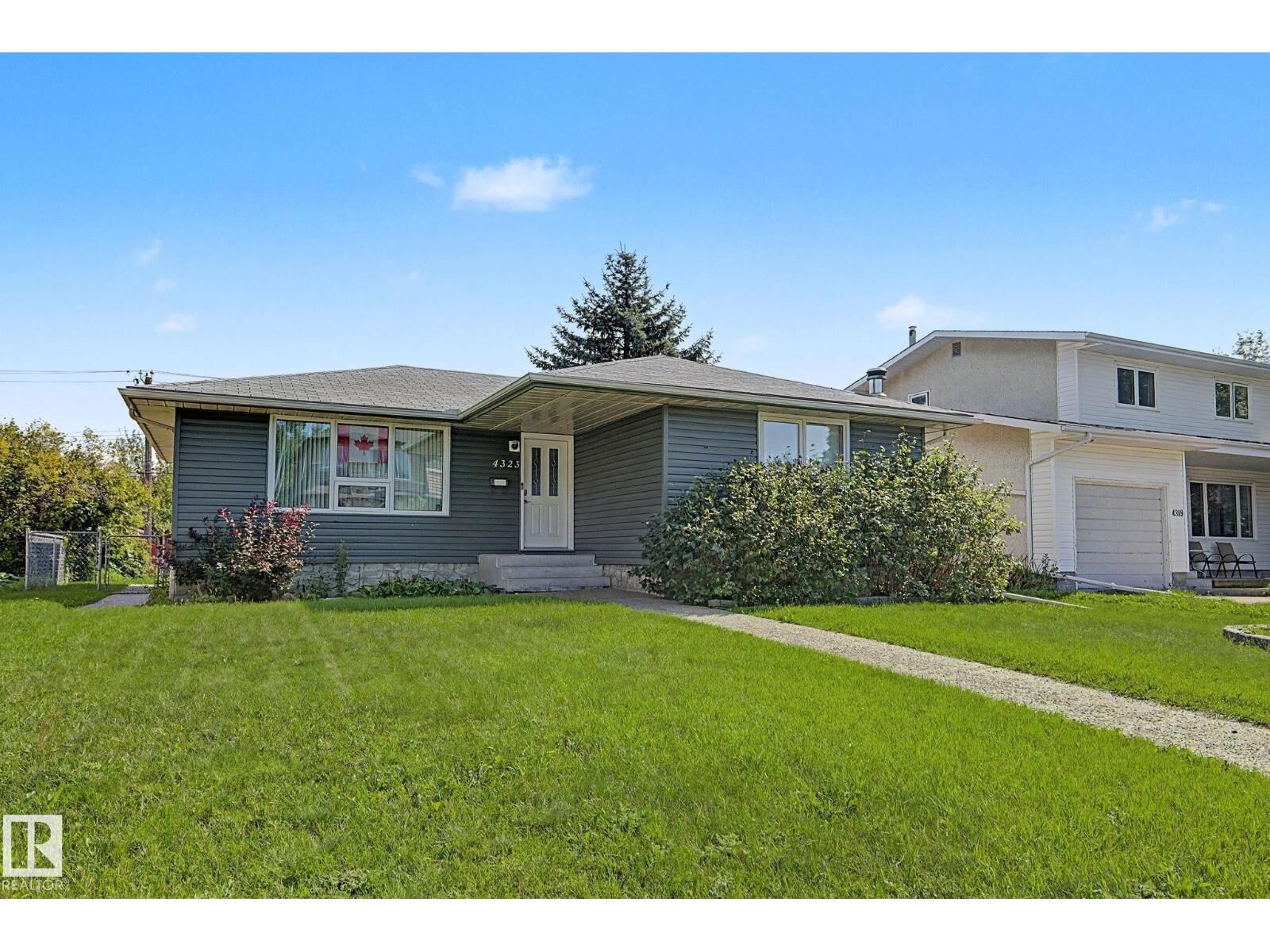 Property Photo: 4323 114B St NW AB T6J 1N8