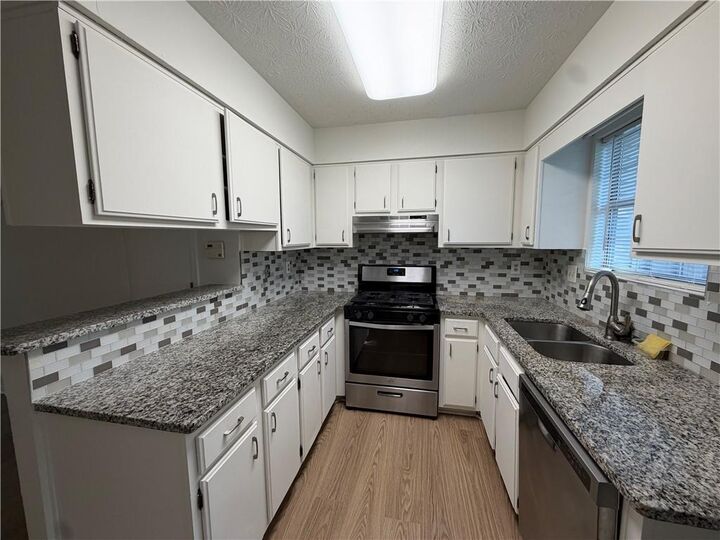 Property Photo:  6644 Ramsgate Way  GA 30093 