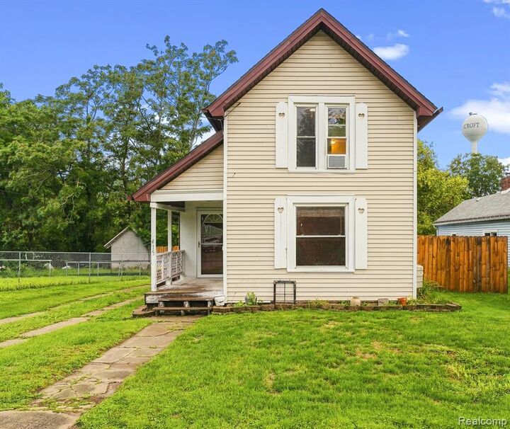 Property Photo:  415 N Shiawassee Street  MI 48414 7731 