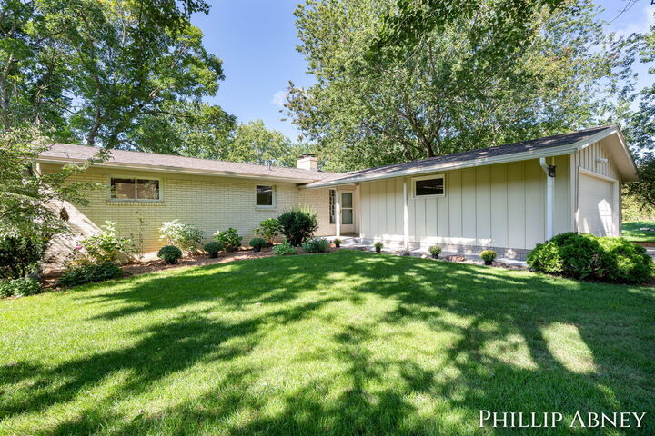 Property Photo: 8391 Cowan Lake Drive NE MI 49341