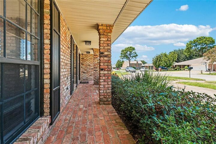 Property Photo:  61 Woodlake Boulevard  LA 70065 