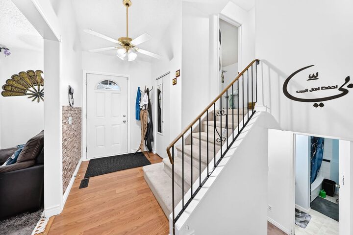 Property Photo: 983 Rundlecairn Way NE AB T1Y 2W7